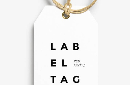 Біла бірка із написом LAB EL TAG